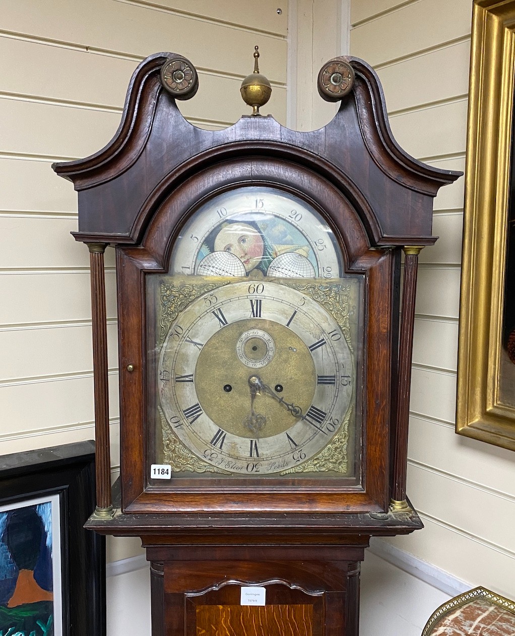 An early 19th century mahogany and oak eight day longcase clock marked J Elliot of Leeds, height 225cm